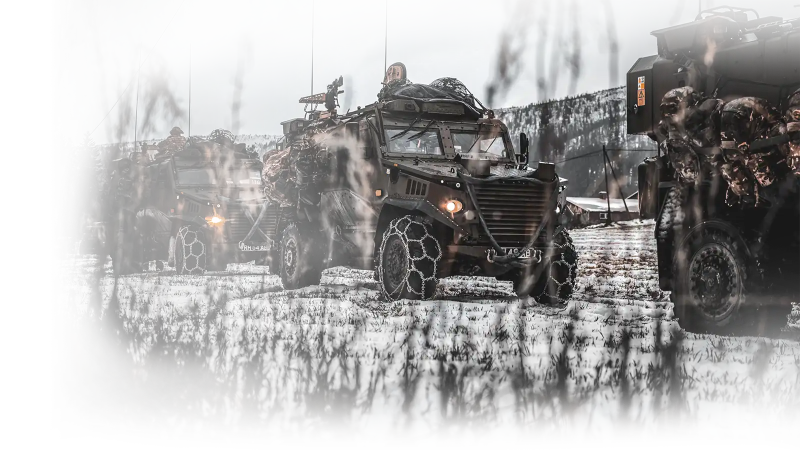 Military vehicles in snowy landscape RF power amplifiers